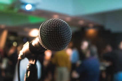 microphone in front of a crowd