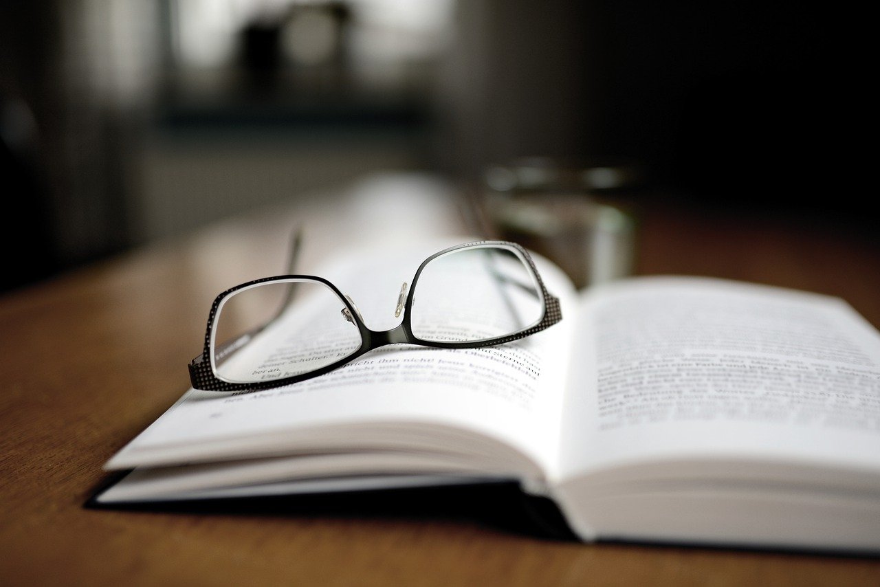 book and glasses