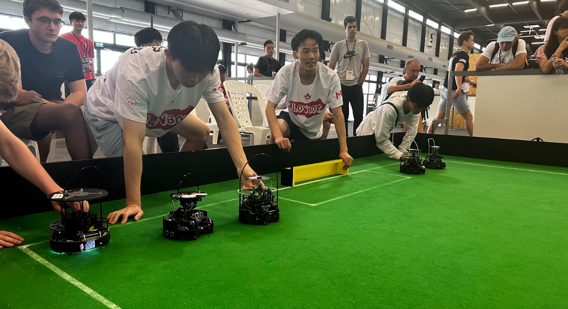 Two teams ready to start - robots on the field